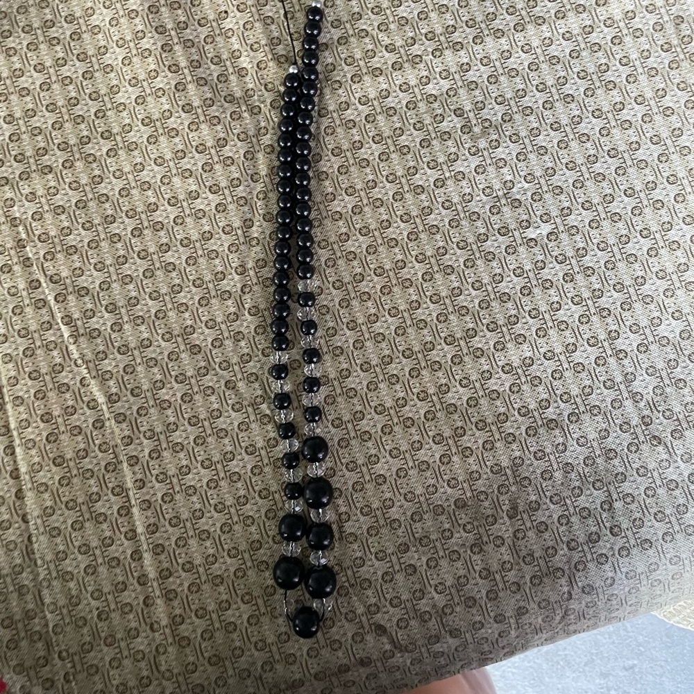 This is a black and clear necklace